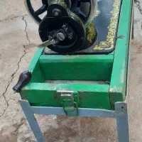 چرخ خیاطی مرد پرنده|چرخ خیاطی و ریسندگی|مسجد سلیمان, |دیوار