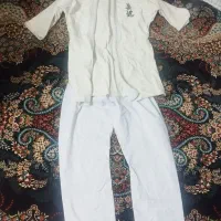 لباس تکواندو|لباس|شاهین‌شهر, نبوت|دیوار