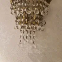 یک عدیوار کوب کریستال خارجی جنس بدنه برنجی