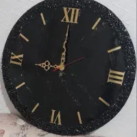 ساعت رزینی مشکی وساعت دفرمه نقره ای