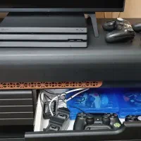 ps4 pro چهار دسته با استند شارژ و ۶ عدد سی دی
