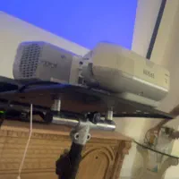 ویدیو پرژکتور و پرده سینما