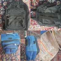 یک عدد ساک مسافرتی و یک عدد کیف دو حالته