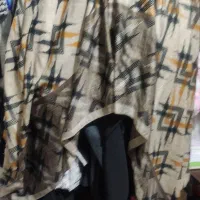 تعدادی مانتو لباس و شال
