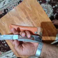 چاقو و انگشتر و اسکناس