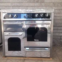 گاز تکنو ۵ شعله طرح فر صفحه استیل در حد نو