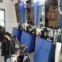 فروش فوق‌العاده دکور پیرایش مردانه با صندلی کودک