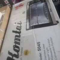 توستر کومتای