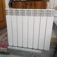 رادیات  آلومینیومی شوفاژ پره ای و روشویی کمدی