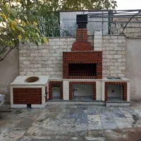 شومینه و باربیکیو سنگی و آجری هیزمی و گازی