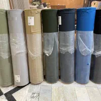 همکارخانم خیاط وسط کار جهت پوشاک