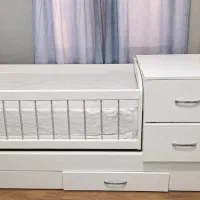 تختخواب گواهواره دار کودک با یکعدد کمد