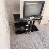 t.v21  اینچ و میز t.v