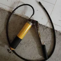 گریس‌گان دستی اهرمی (Lever Grease Gun)
