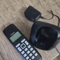 تلفن بی سیم در حد با کارتن