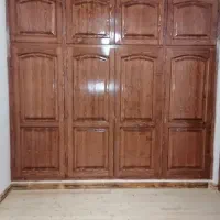 تولید انواع کابینت،کمد دیواری،درب،پله،کلبه سوییسی