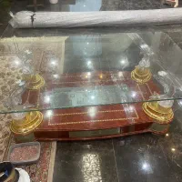 میز شیشه ای وسط مبل
