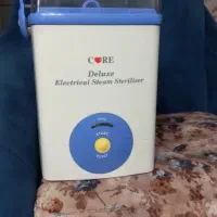 گرم نگه دارنده شیشه شیر
