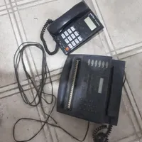 یک عددتلفن رومیزی و یک عدد دستگاه فاکس