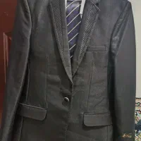 کت و شلوار یکبار تن رفته