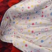 کاپشن|کفش و لباس بچه|قم, قلعه کامکار|دیوار