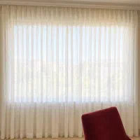 پرده‌بامیله‌‌خال دار سفید ساده