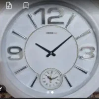 ساعت دیواری سفیدو نقره ای
