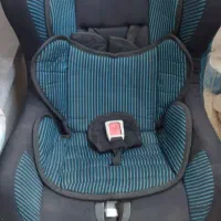 صندلی ماشین کودک در حد نو و کریر کودک و پشه بند