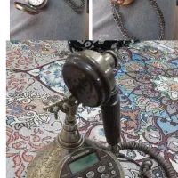 ساعت گردنی و تلفن رومیزی سلطنتی