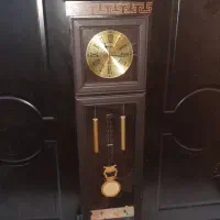 ساعت ایستاده چوبی.بوفه.میز تلفن.لوستر