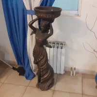 مجسمه زن سبدروسر