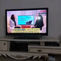تلوزیون به همراه میز تلوزیون|تلویزیون و پروژکتور|تهران, دولتخواه شمالی|دیوار