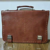 تعدادی کیف اداری مردانه چرم و ست هدیه مردانه نو