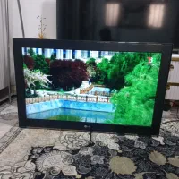 تلویزون 32اینچ مارک LG همرا با میز و کارتن