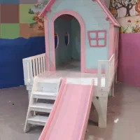کلبه چوبی سرسره دار کودک
