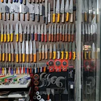فروش انواع چاقو کارد مصقل سنگ ساطور و تیزکاری|ظروف پختوپز|تهران, خاک سفید|دیوار