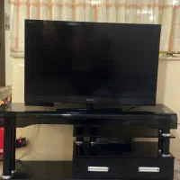 میز تلویزیون شیشه ای