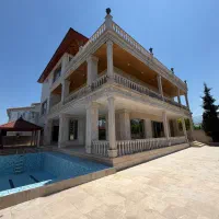 ۶۰۰متر زمین ۵۰۰متر بنا ۵خواب مدارک کامل