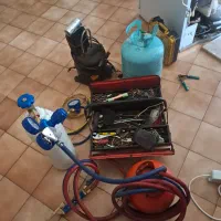 تعمیر انواع یخچال فریزر خانگی و فروشگاهی تضمینی