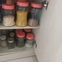 بانکه ی شیشه ای در صورتی