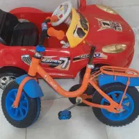 ماشین شارژی و دوچرخه