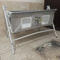 گهواره مسافرتی تاشو راحت جمع میشه و نصب میشه