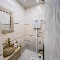 بنایی ساختمان رفع نم حمام و توالت و کاشی سرامیک