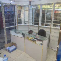 دکور مغازه زیر خرید طلایی هفت عدد قفسه