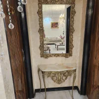 ایینه کنسول و شمعدان و ساعت ۵۰میلیون وزن بالا