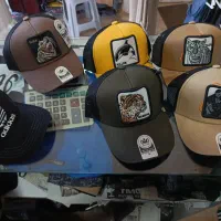 کلاه گورین پشت تور گلدوزی بیسبالی