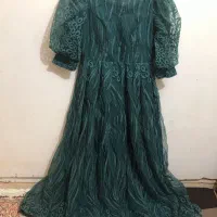 یک لباس مجلسی و یک کت زنانه و یک کیف مجلسی