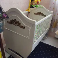 تخت گهوارهای کودک با تشک نونو.تخت بچگانه|اسباب و اثاث بچه|پرند, فاز ۳|دیوار