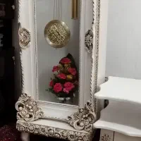 ساعت و زیر تلویزیون