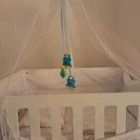 تخت نوزاد و کریر پارچه برزنتی